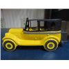 Image 2 : Avon 1926 Checker Cab. 5-ounce yellow painted over clear glass. Black plastic trunk cap & top. House