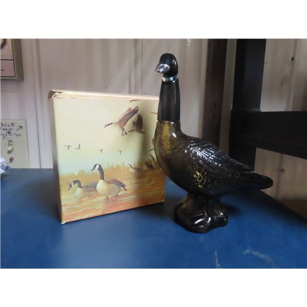Avon Canada Goose Decanter. 5-ounce brown glass with black plastic head. Housed in its original Avon
