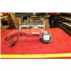 Image 2 : Milwaukee Angle Grinder, working