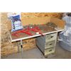 Image 2 : Shop desk, loading chains, chain ratcheting load binders and bag of Abrasive Gravel