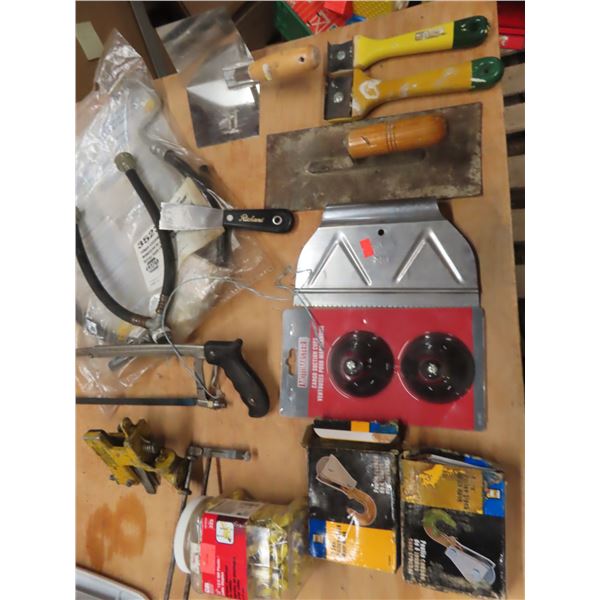 drywall tools , hooks , suction cups , hacksaw