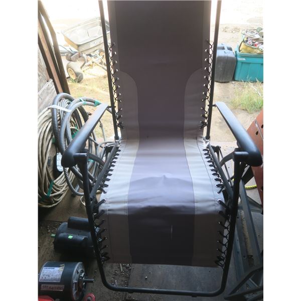 two reclining lawn chairs