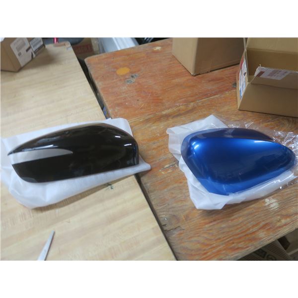 two mazda mirror housings