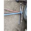 Image 3 : a post hole auger and 2 post hole shovels