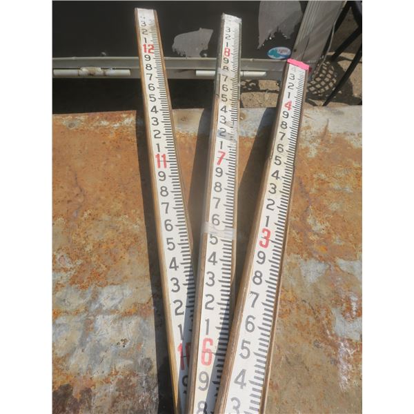 vintage measuring sticks
