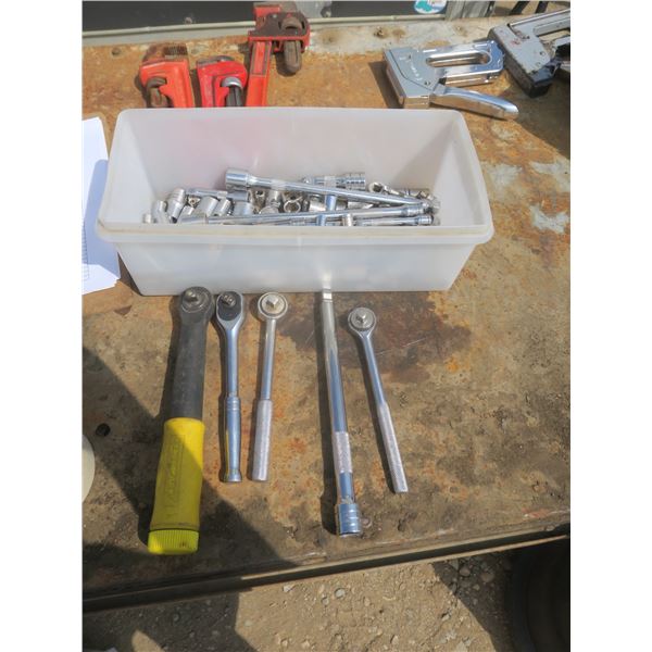 tote of ratchets and sockets