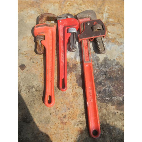 two 12" and one 18" pipe wrenches