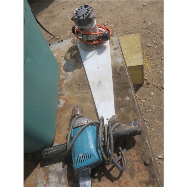 tote of assorted power tools