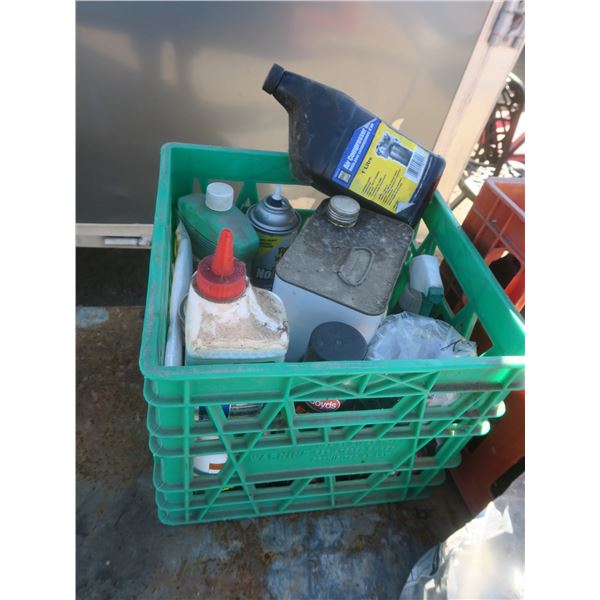 two totes of oil and grease