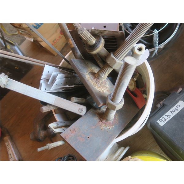 bucket of steel and assorted hardware