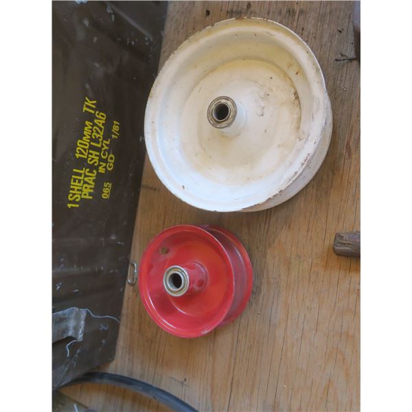 two small lawnmower rims