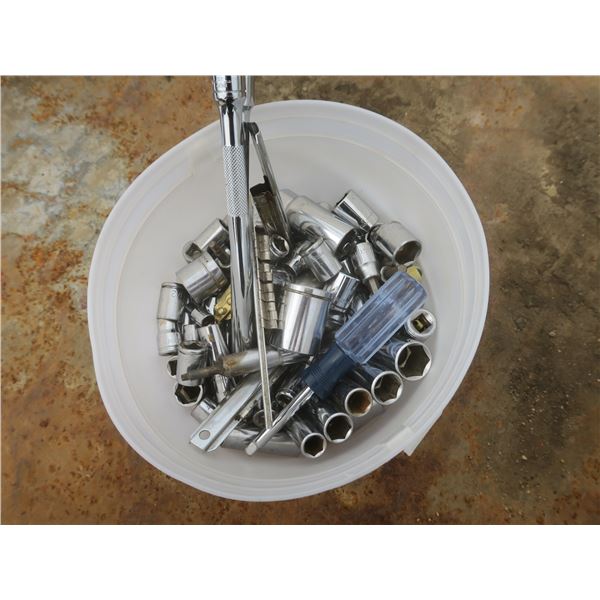 bucket of assorted sockets