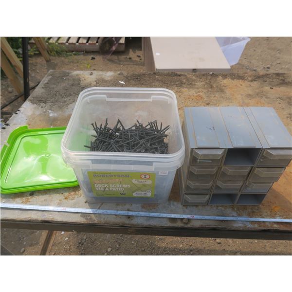 pale of screws and bolt bin with hardware