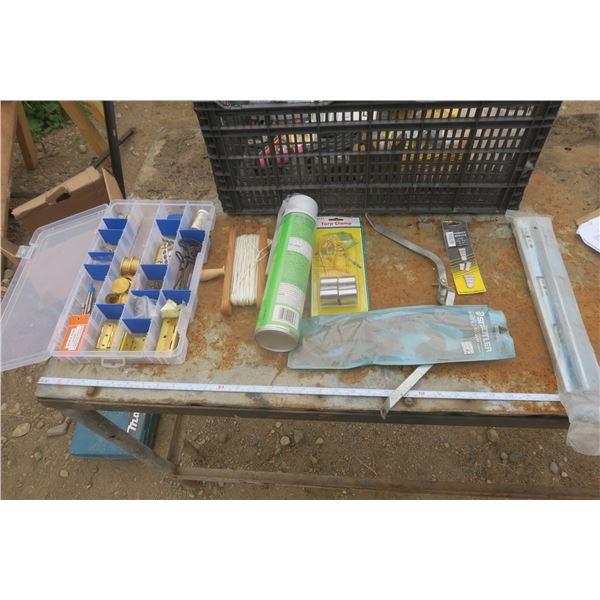 tote of assorted hardware
