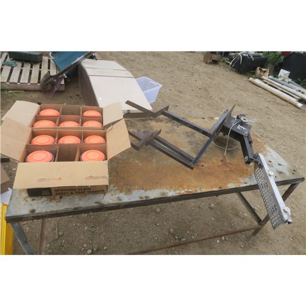 clay pigeons and clay pigeon thrower