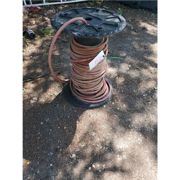 Spool with air compressor hose