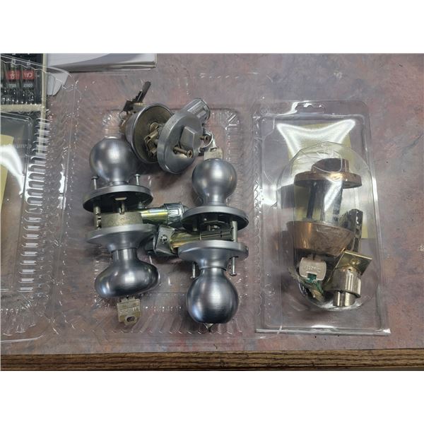 two dead bolts & two door knobs