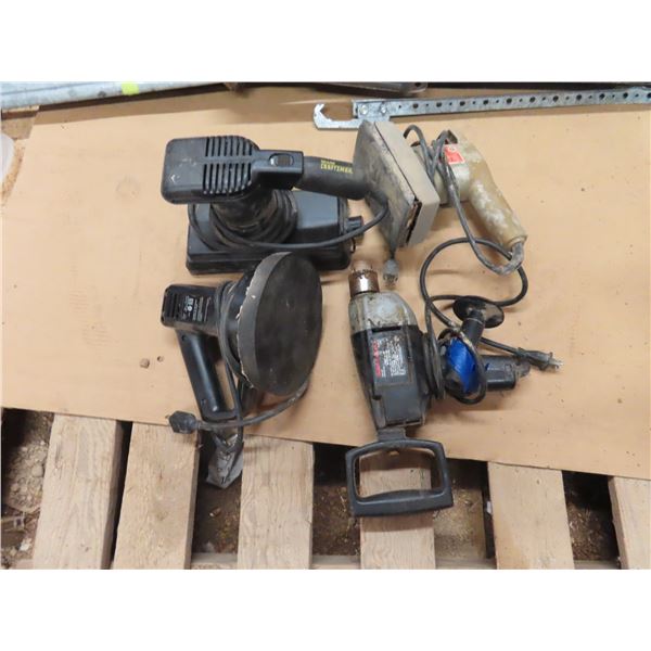 box of assorted power tools