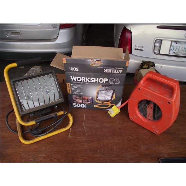 2- 500 watt hologen work lamps, 1 used and one new in box. 6 extra bulbs. One cord reel 25 foot.