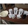 Image 1 : 1- microwave dish, 4-Canisters, and 4 Coffee Mugs.