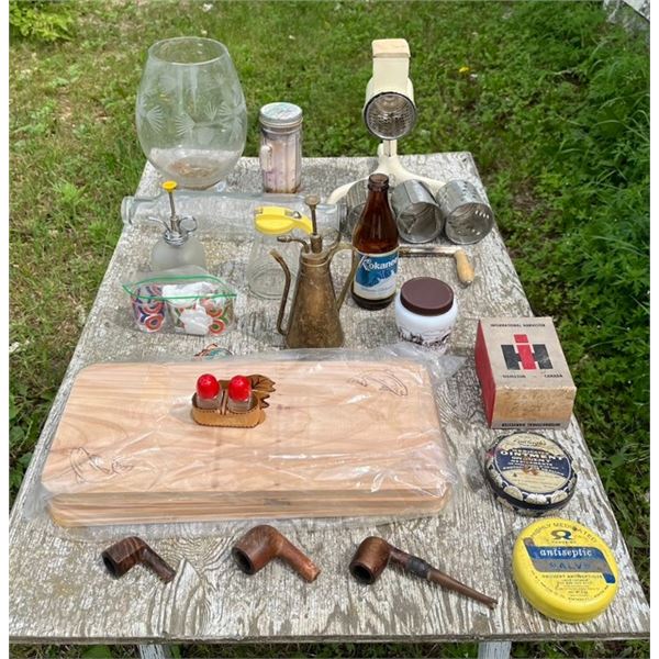 Box of miscellaneous antiques - tobacco pipes, tins, food grader