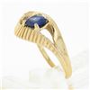 Image 8 : 14k Gold 0.80 ctw Oval Sapphire Solitaire Polished Grooved Open Loop Bypass Ring
