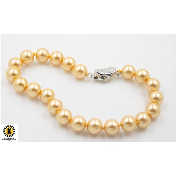#52-SEA SHELL PEARL BRACELET 7.5"