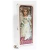 Image 1 : PORCELAIN DOLL IN WHITE DRESS