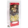 Image 1 : PORCELAIN DOLL IN YELLOW &ÿGREY DRESS