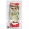 Image 1 : PORCELAIN DOLL IN GREY DRESS
