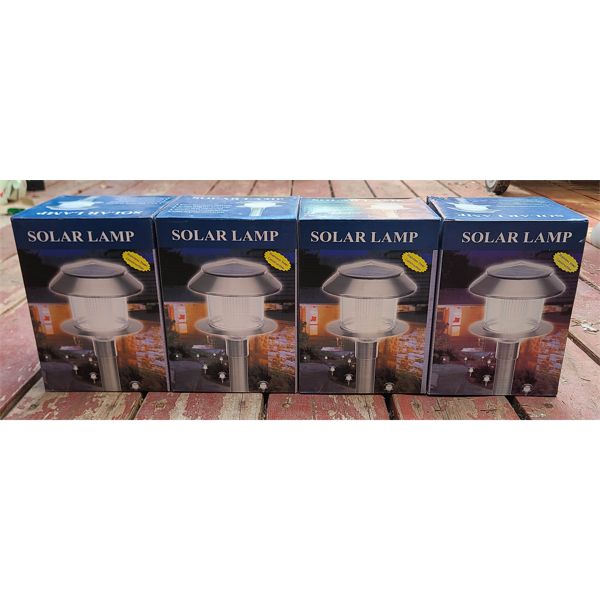 4 SOLAR LAMPS - COMES ON AUTOMATICALLY AT DUSK