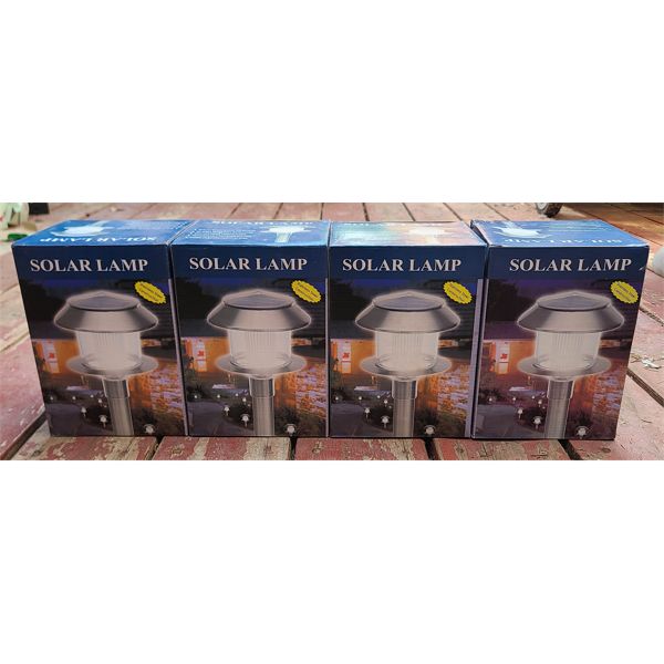 4 SOLAR LAMPS - COMES ON AUTOMATICALLY AT DUSK