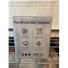 Image 2 : Small and Portable handheld mini steamer