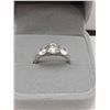 Image 1 : GRA CERTIFIED MOISSANITE VVS D WEIGHING AN ESTIMATED 1.00 CARAT WITH A CUBIC ZIRCONIUM ON EITHER SID