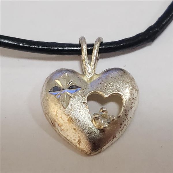 Silver Cubic Zirconia W/ Cord Pendant (~Size 0) (~length 0inches), Suggested Retail Value $80