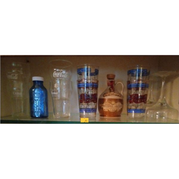 Collection of Old Pepsi and Coke Glasses with Old Medicine Bottles