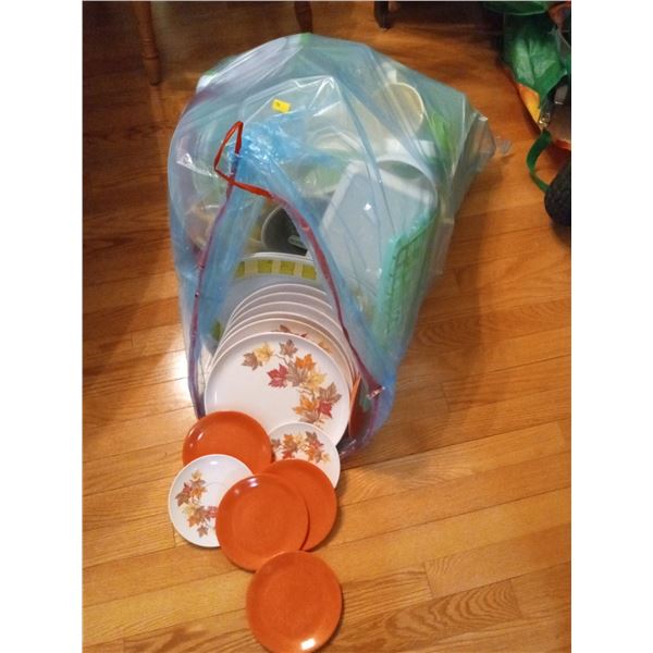 Bag Full of Various Plastic Dishes