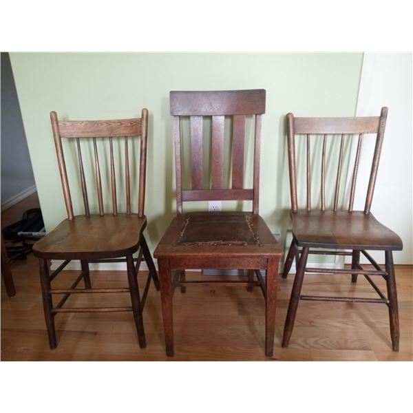 Three Similar Sized Wooden Chairs with Different Shape