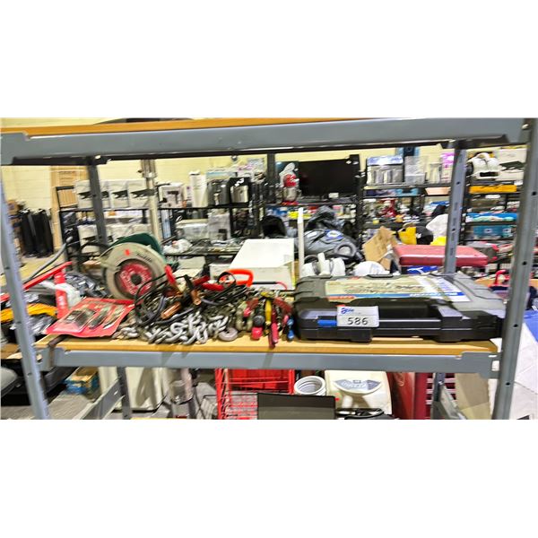 SHELF OF ASSORTED TOOLS INCLUDING; CIRCULAR SAW, SOCKET AND TOOL SET, TIN SNIPS AND MORE