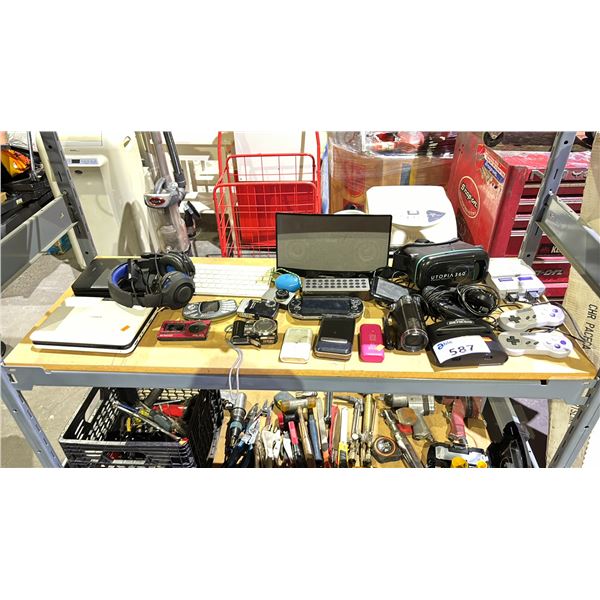 SHELF OF ASSORTED ELECTRONICS INCLUDING; VR HEADSET, PSVITA, HEADSET AND MORE