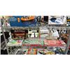 Image 3 : RACK OF ASSORTED GAMES AND TOYS *RACK NOT INCLUDED*