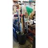 Image 1 : GARBAGE CAN FULL OF SCRAPERS, BROOM HANDLES AND MOP ETC.