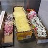 Image 1 : BOX OF HAWAIIAN GRASS SKIRTS, LEIS, AND ARTIFICIAL FLOWER ARRANGEMENTS
