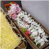 Image 2 : BOX OF HAWAIIAN GRASS SKIRTS, LEIS, AND ARTIFICIAL FLOWER ARRANGEMENTS