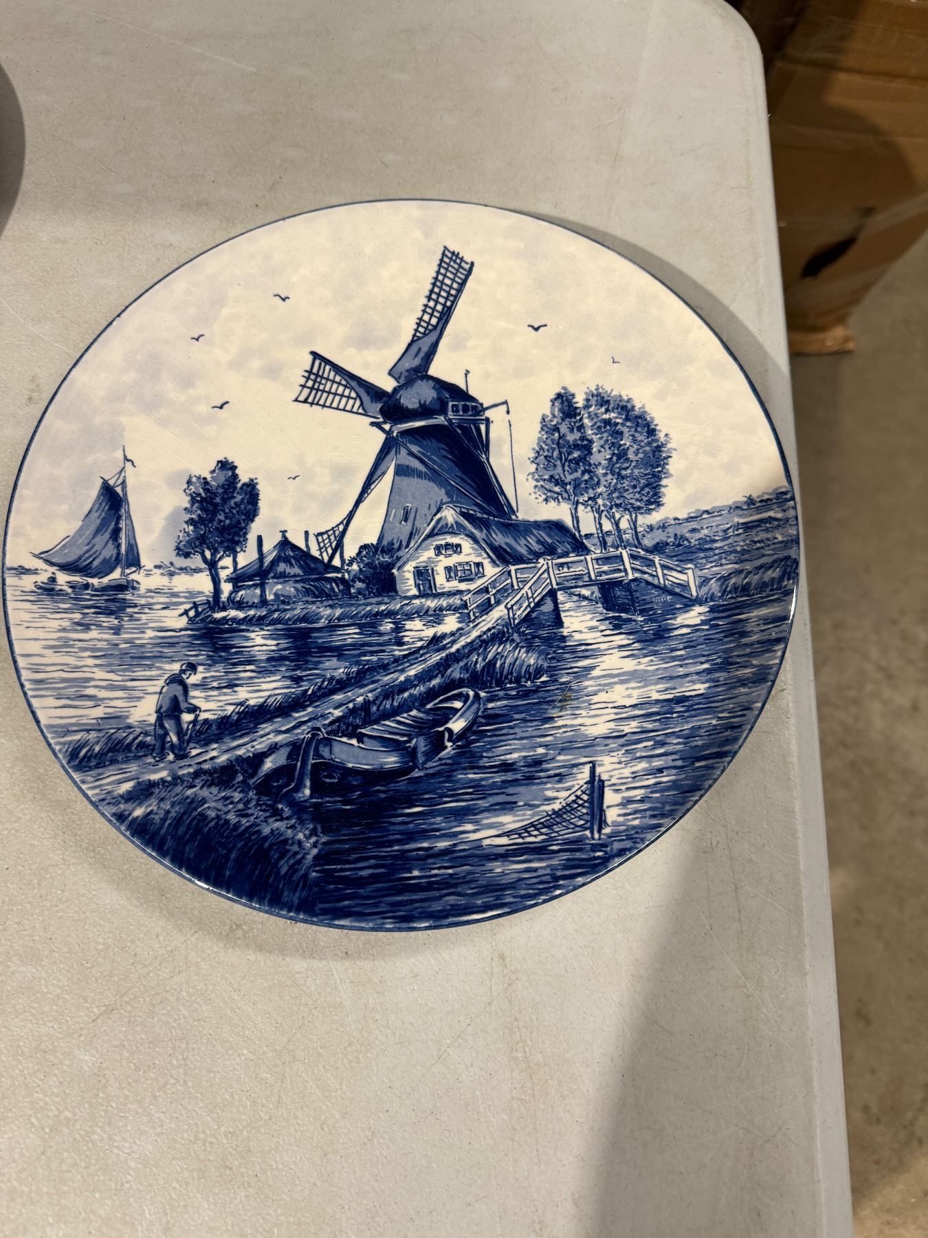 Delft hand painted maiden Holland plate