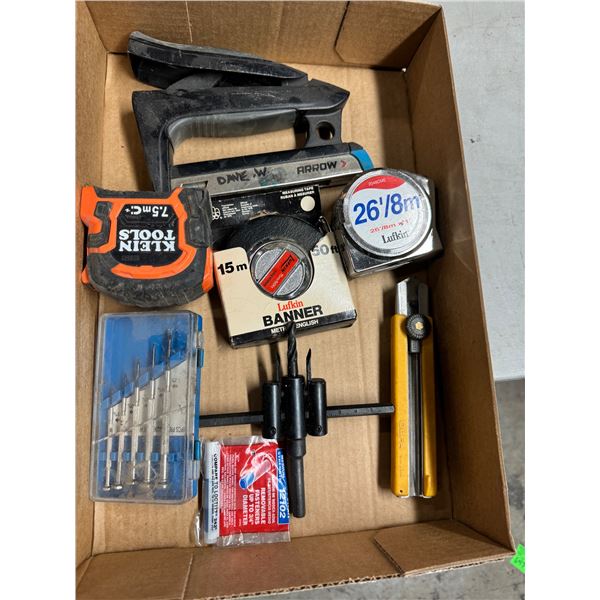 Tape measures staple gun and other items