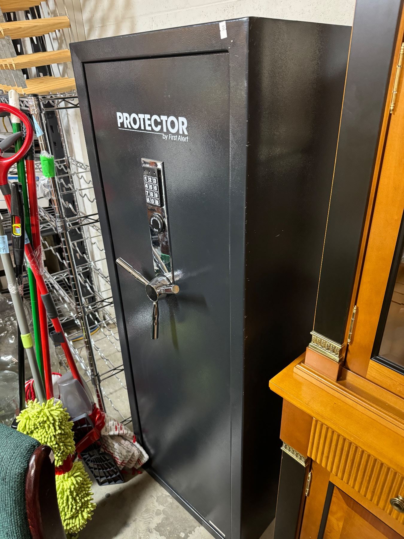 Protector by first alert safe with key and combination