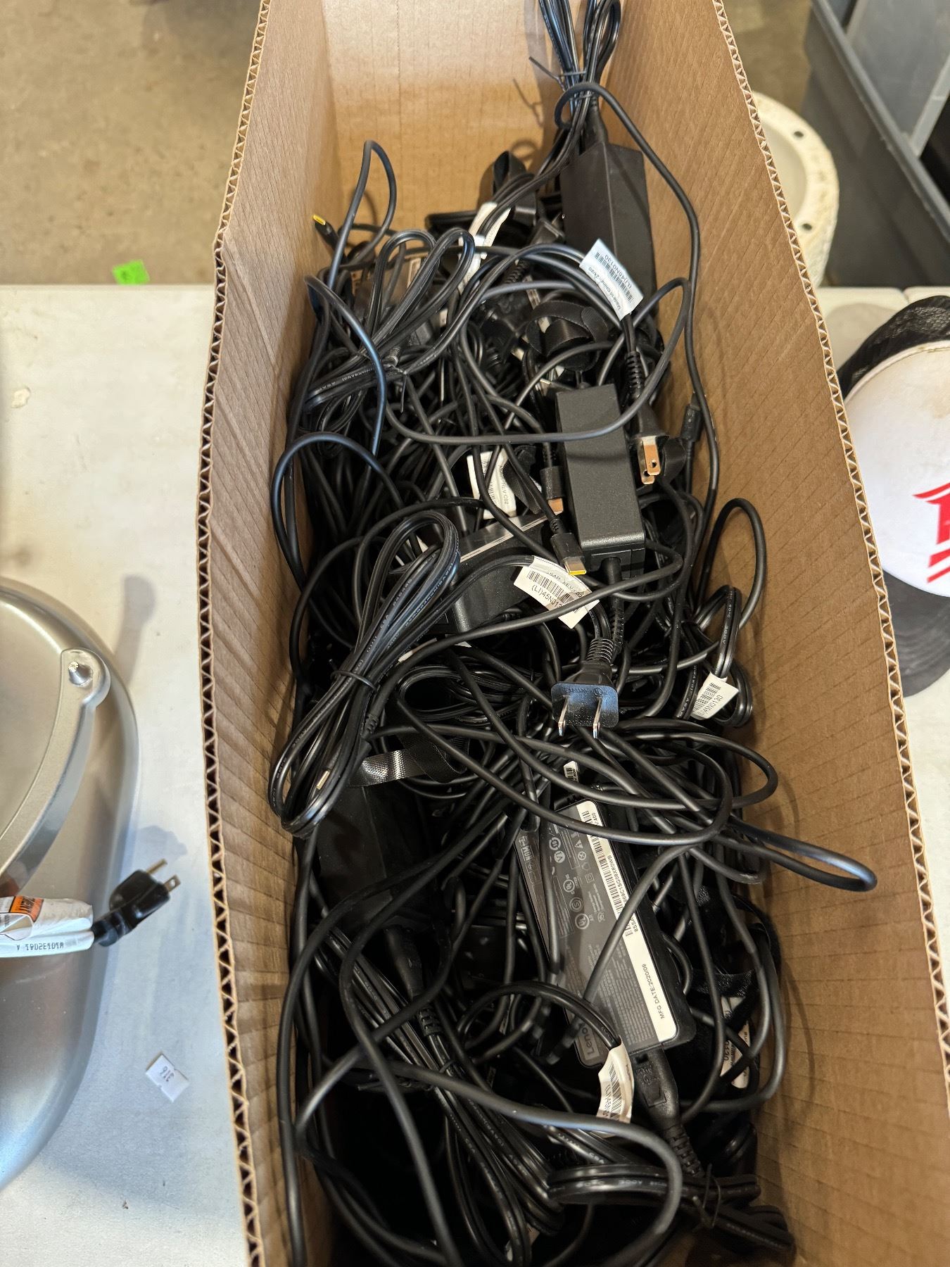 Box of Lenovo Laptop chargers