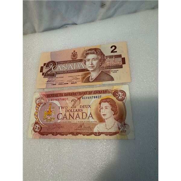 1974, 1986 two dollar bills