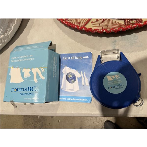 Indoor/outdoor retractable clothesline